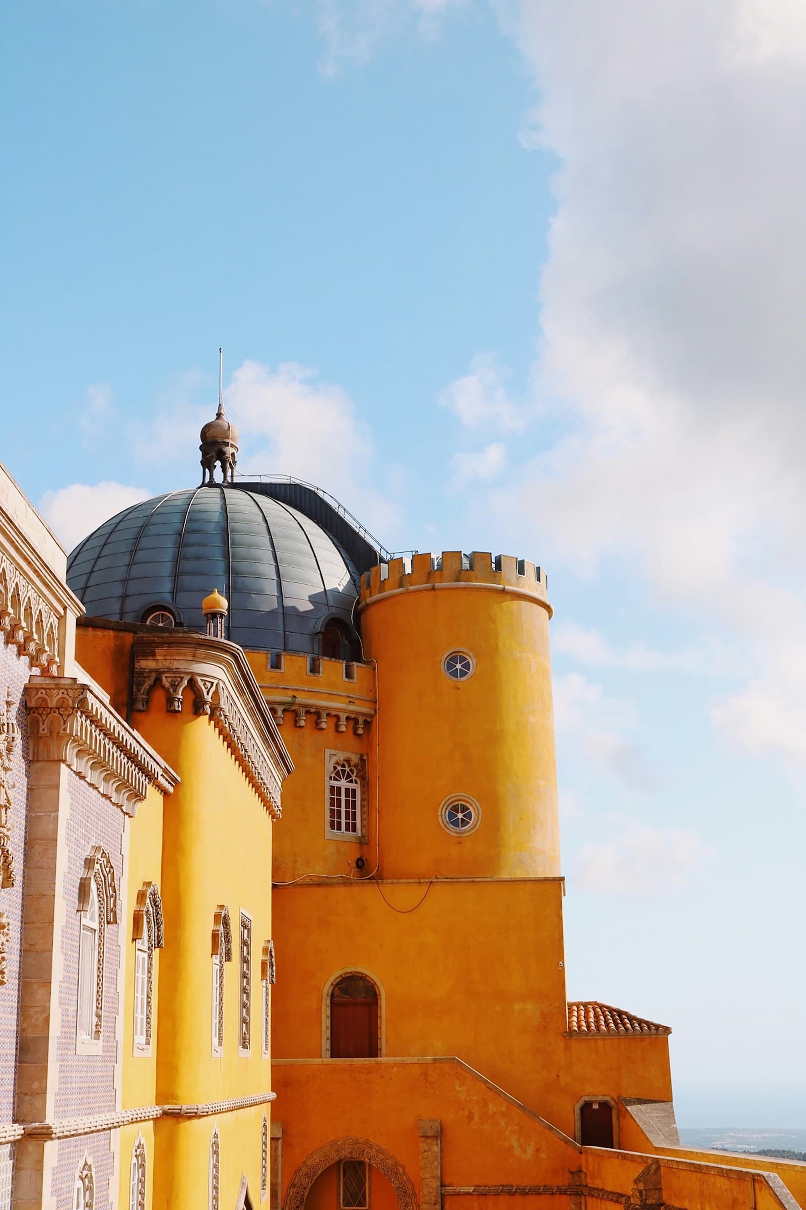 Sintra palace surrounded by misty ancient forest, Portugal